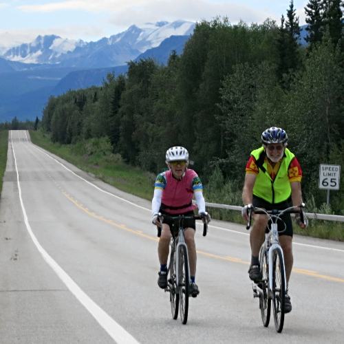 Two cyclists on Alaska Highway