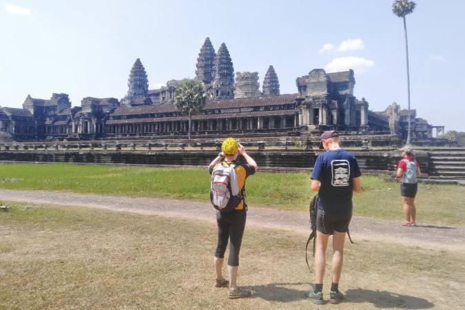 bicyclists exploring Angkor Wat