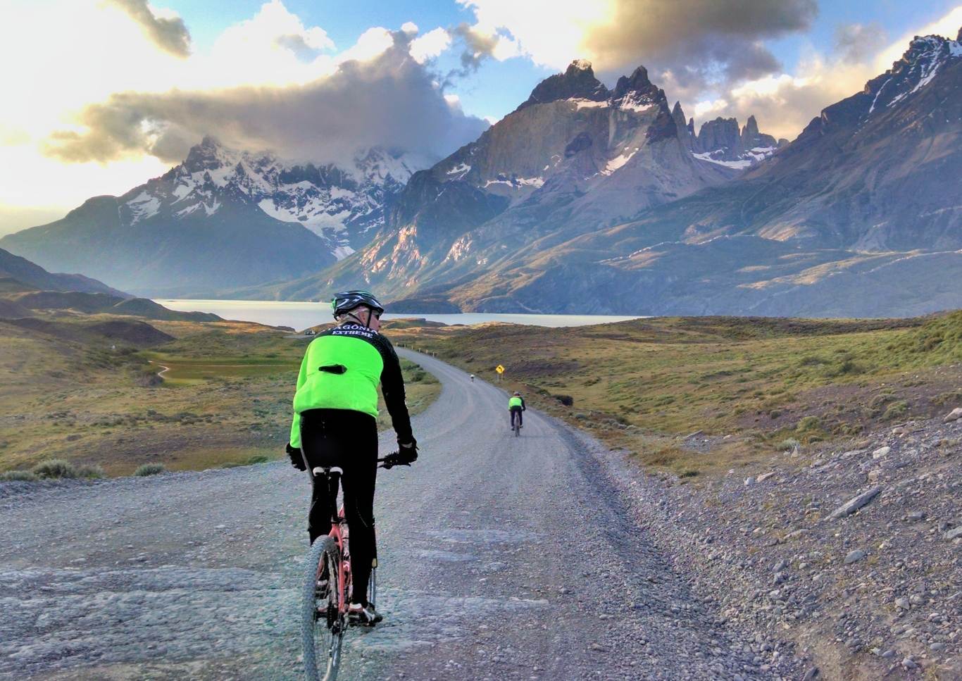Bicyclists on road to Torres De Paine National Park